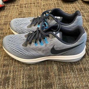 Blue Nike running shoes